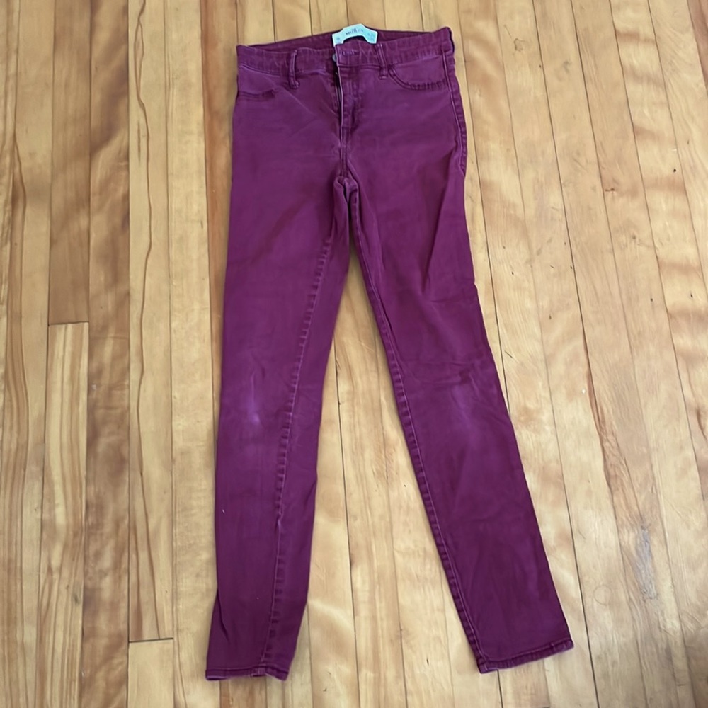A pair of HOLLISTER purple skinny jeans